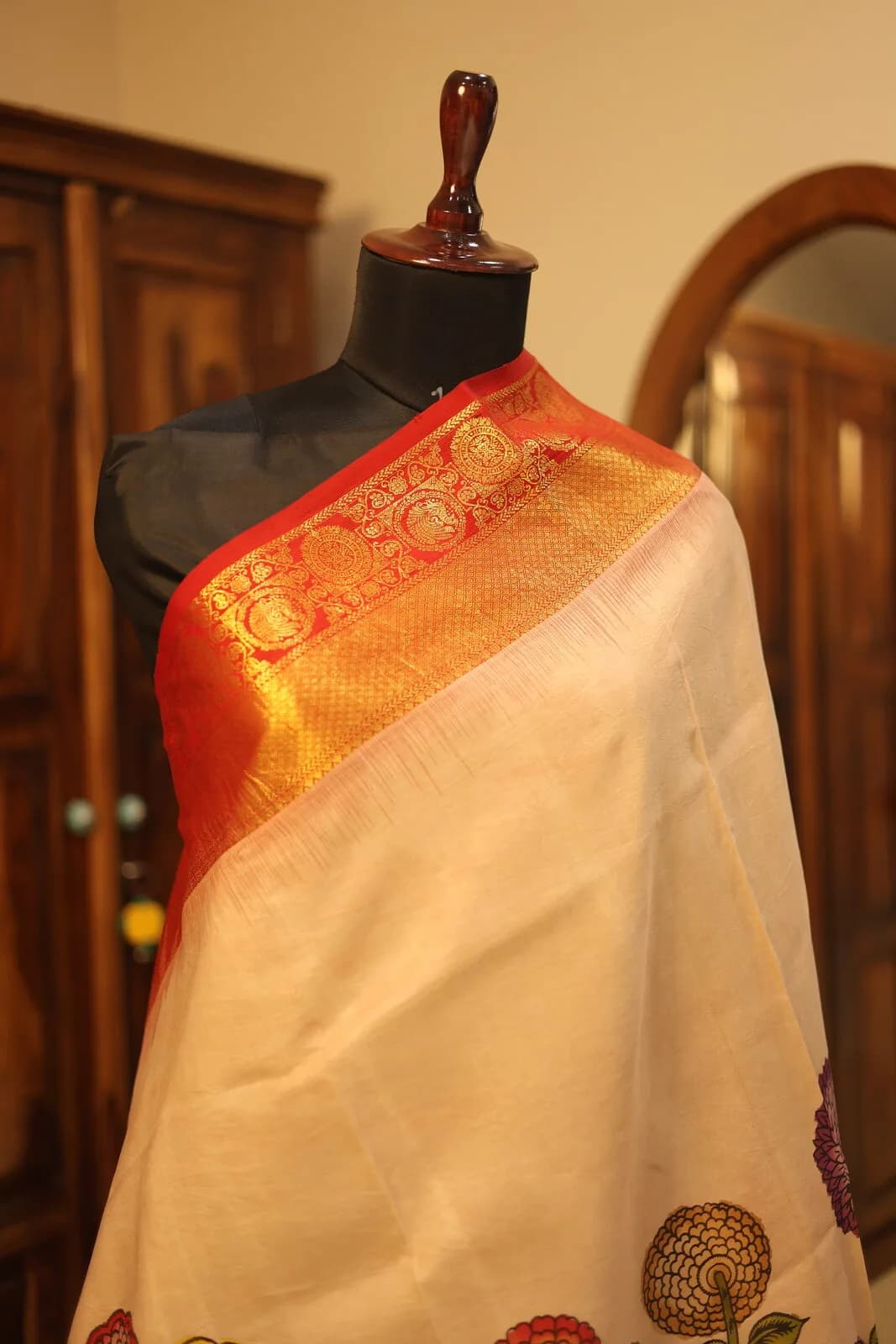 Cream Saree with Ornamental Floral Design and Orange Red Geometric Border
